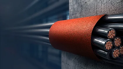 TAFF Brandschutzgewebe mit ummantelten Kabeln als flexible F120 Brandschutzlösung für Kabeltrassen und Installationen